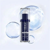 Obagi Cellular Renewal Serum in a clear cylindrical bottle with a dark navy blue pump and label, centered against a pale blue-white background with translucent bubble graphics.