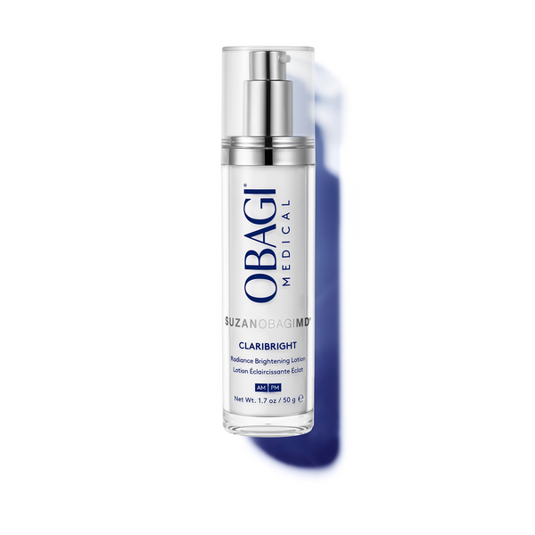 Obagi Medical Suzanobagidy Claribright Radiance Brightening Lotion in a clear pump bottle with a silver collar and blue text, set against a white background with a soft blue shadow.